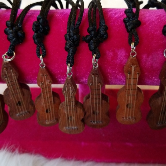 5/$25  Hawaiian ukulele necklace - Picture 2 of 4